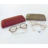 Two cased pairs of vintage Spectacles, one with yellow metal frame (2)