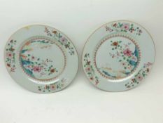 A pair of Chinese Circular Plates, typically decorated in famille rose and verte etc, with central