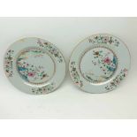 A pair of Chinese Circular Plates, typically decorated in famille rose and verte etc, with central