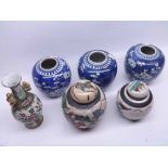 A collection of three Oriental Ginger Jars decorated in underglaze blue with a prunus blossom design