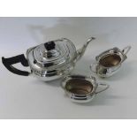 A mid/late 20th Century Three Piece Electroplated Tea Set in Regency style, of compressed oval form,