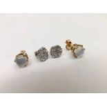 A cased pair of precious metal all small Old Cut Diamond set Cluster Stud Earrings together with a