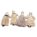 Four Bisque Head and Shoulder Plate Dolls House type Dolls