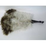 A vintage Ostrich feather Fan with faux Tortoiseshell sticks (A/F)