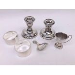 A Mixed Lot comprising: a pair of small Silver Encased Dressing Table Candlesticks, 7cm tall,