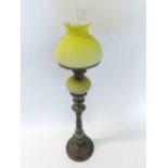 A 19th Century Electroplated Tall Candlestick in Rococo style, 39cm tall, surmounted by a lemon