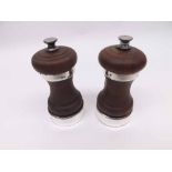 A pair of George VI Treen and Silver Mounted Pepper Mills, Birmingham 1951, Makers AC Co Ltd, 11cm