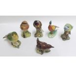 A collection of six Beswick Birds: Greenfinch, 2105; Robin, 980A (beak missing); Wren, 993;