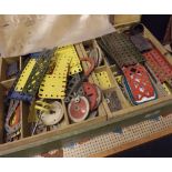A large Pine Box housing a quantity of vintage Meccano Pieces and accessories, together with a