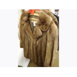 A 1960s Ladies long Mink jacket retailed by Brahams of Norfolk