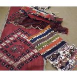 A mixed lot of various Kilim off-cuts, bags, small Prayer Rugs and large cut rug A/F etc