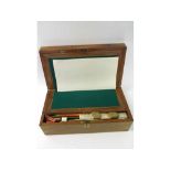 A Walnut Writing Box, with vacant brass nameplate, similar escutcheon and brass bound corners,