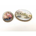 Victorian oval metal frame Brooch with central ceramic panel hand painted with Madonna and Child,