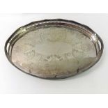 A 20th Century Electroplated Tea Tray, oval shaped with foliate and scroll designs to the centre,
