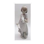 A Lladro (Collectors Society) Figure of a young girl with dove perched on her left hand and with a