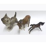 Three Beswick Models: Persian Kitten standing, 1885; Donkey, 1364B; Foal (small, stretched, facing