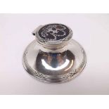 A George V Silver encased Capstan Inkwell, the loaded base with reed and tie edge, the hinged lid