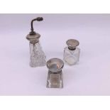 A Mixed Group comprising: a cut glass Lighthouse-shaped Scent Atomiser with Sterling mount and metal