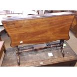 Victorian Mahogany Sutherland Table, two shaped drop flaps over ring turned supports joined by a