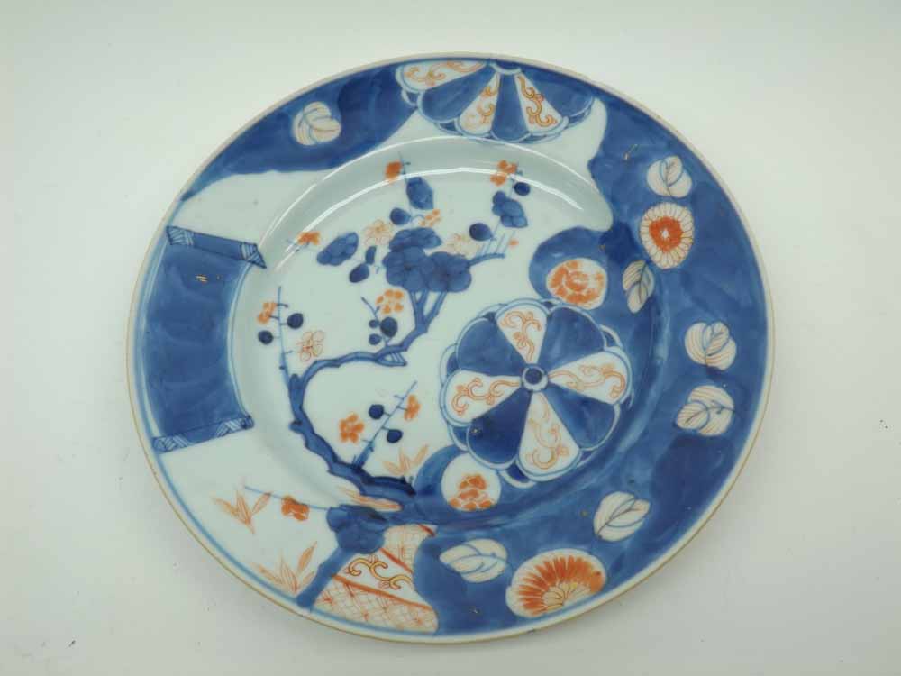 A Chinese Circular Plate, typically decorated in colours and underglaze blue with iron red