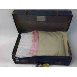 A suitcase and a box containing a large quantity of assorted vintage textiles to include French