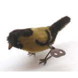 An early 20th Century Cut Moquette Covered Finch type Clockwork Bird