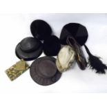 A mixed box containing various Ladies vintage accessories to include hats, bags, compact etc