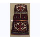 Caucasian Saddle Bag type carpet, decorated with four panels of geometric designs, lozenges etc on