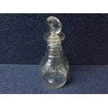 A 19th Century clear Glass mallet-formed Decanter decorated with ribbed detail and fitted with