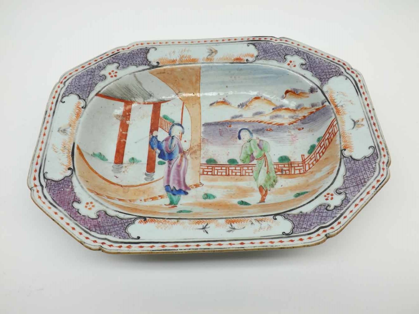 A Chinese Octagonal Dish of canted rectangular form, the centre painted in underglaze blue,
