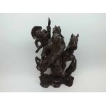 A Chinese Carved Hardwood Group of Samurai and attendant, mounted on horseback, 14" high