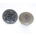 Two Chinese Saucer Dishes, one decorated in underglaze blue with foliage and the other with