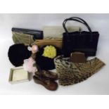 Two boxes containing a quantity of Ladies vintage accessories to include hats, bags, compacts, and a