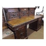 Large mid/late 19th Century Oak twin pedestal Sideboard, moulded throughout in the Gothic manner