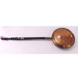 Copper warming pan with ebonised handle, 40" long