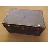 A large vintage travelling trunk with bound edges and Brass locks, 32" x 20" x 17"