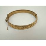Early/mid-20th Century engraved Gold plated Bangle