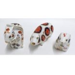 Three Royal Crown Derby Paperweights: Harvest Mouse; Squirrel (both with gold buttons); Pig (