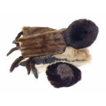 A box containing a Mink fur stole, Fox fur collar and two fur hats