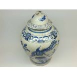 A Chinese Covered Large Jar, painted in underglaze blue with birds and foliage, the neck applied