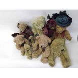 A box of assorted modern Collectors Teddy bears to include Russ, The Bearington Collection vintage