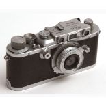 A 1938 Leica III 35mm Camera, Serial No 269640, fitted with Leitz Elmar F = 5cm 1.35 lens with