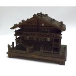 Novelty carved Softwood Box in the form of a Swiss Chalet, fitted with hinged lid, bearing makers