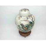 A Chinese Large Covered Ginger Jar, well-painted predominantly in famille verte with iron red and