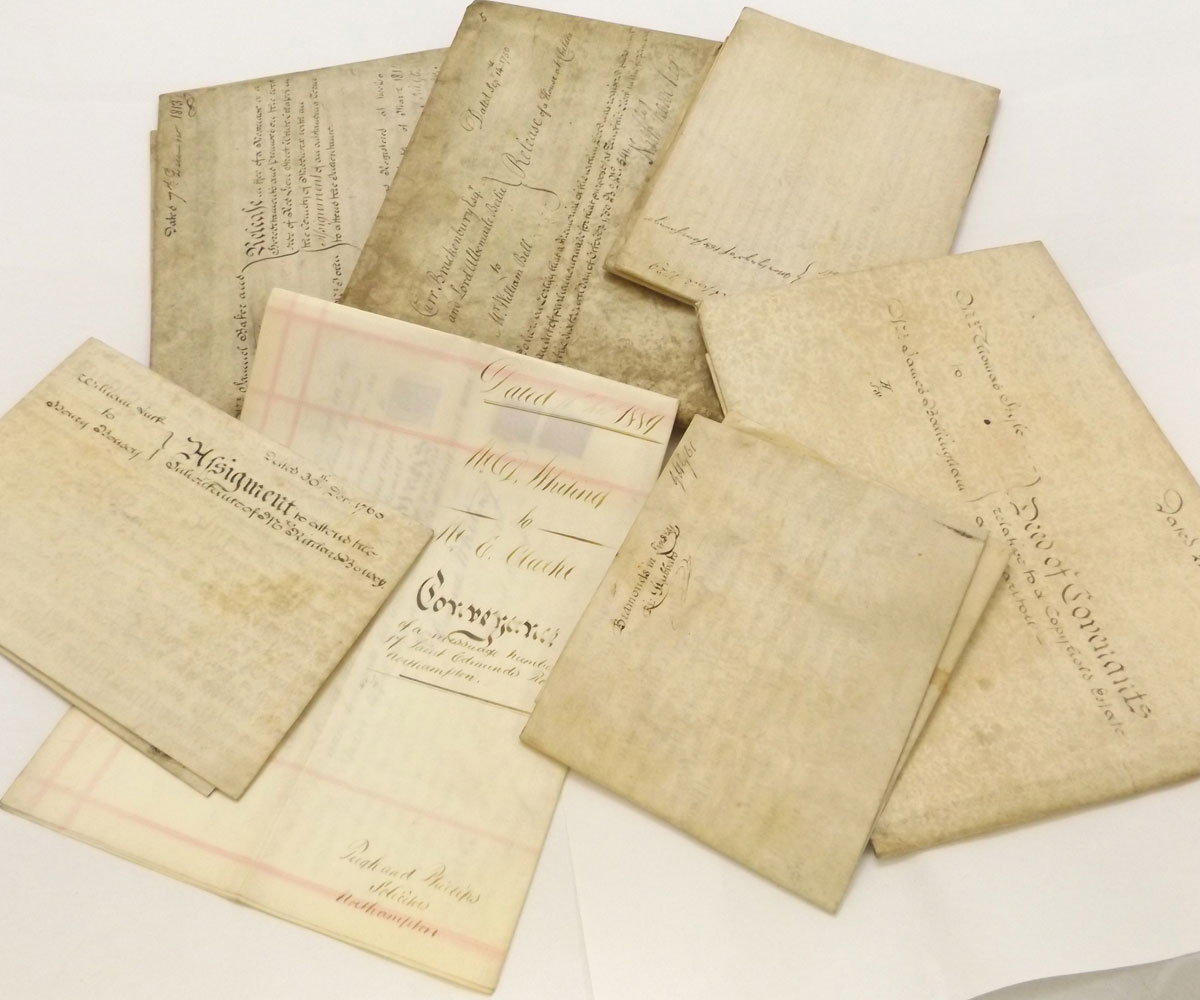 Packet: approx 8 mainly 18th Century vell indentures including tripartite relating to Sussex dated