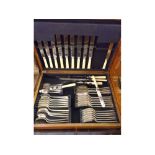 Early 20th Century Oak cased canteen of Silver plated and Steel bladed cutlery complete with three-