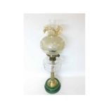 A Victorian Composite Oil Lamp, later shade with crimped rim, over a clear glass facetted font,