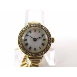 An early 20th Century Diamond Set Ladies Dress Watch, the frosted gilt movement jewelled to the