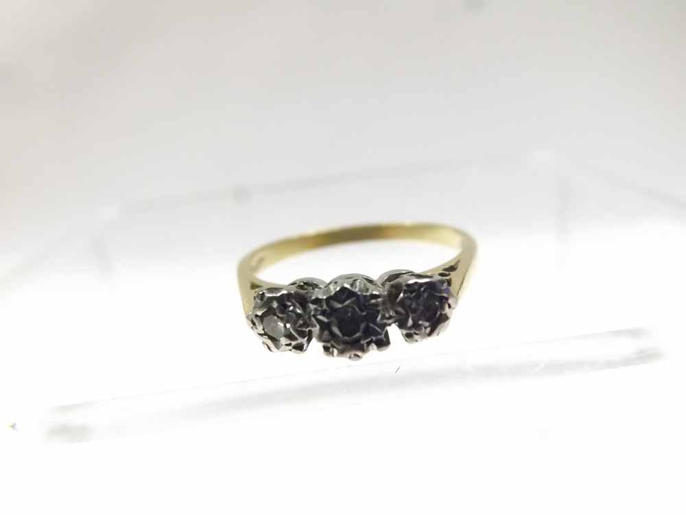 High grade precious metal Ring set with three small Brilliant Cut Diamonds, stamped “18ct and Plat”,