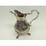 Victorian Silver Cream Jug fitted with looped handle and raised on three swept legs, the body